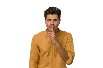 Young handsome caucasian man isolated on white background keeping a secret or asking for silence.