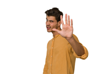Young handsome caucasian man isolated on white background rejecting someone showing a gesture of disgust.