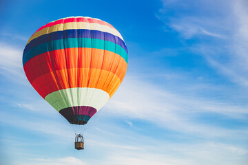 Colorful balloon flying on summer sky with copy space for text