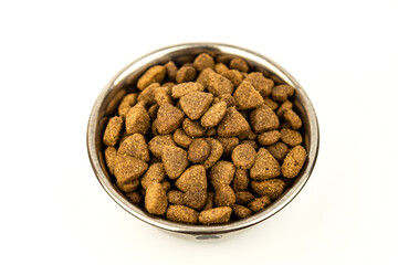 Pet food in a plate on a white background. View from above. Isolate