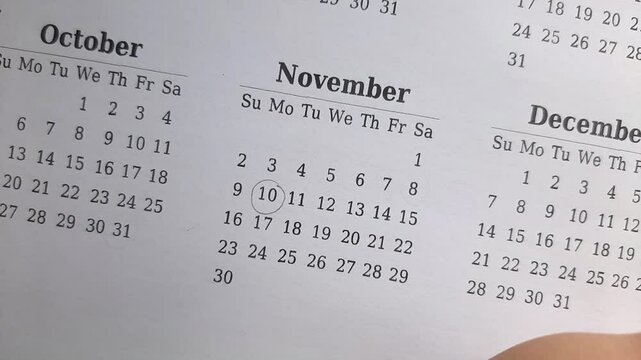 marking 10 November date on the calendar	
