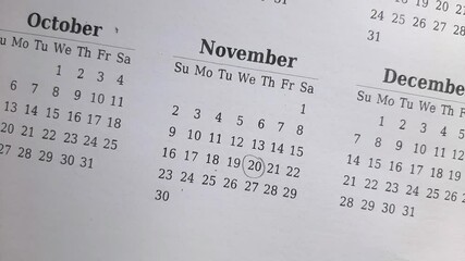 marking 20 November date on the calendar	

