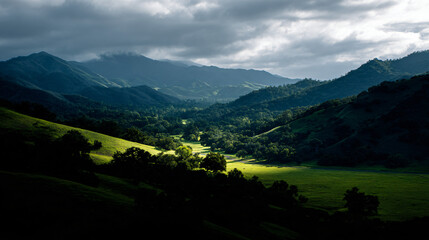 Expansive landscape of a gullible valley smother by majestic hills, perfect for nature photography.
