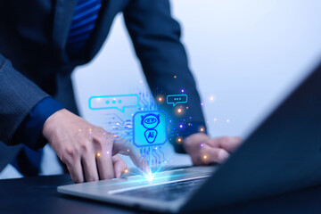 Man using laptop to chat with AI Chatbot Assistant or Artificial Intelligence Technology, Holographic Robot Application and Global Connectivity