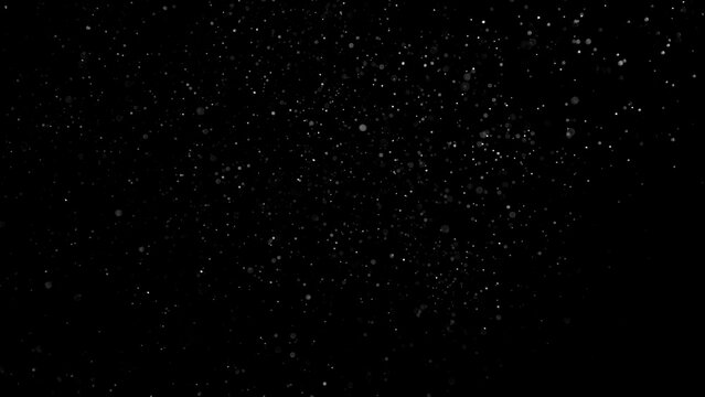 Air particles in soft golden ambient atmosphere