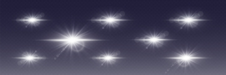 Obraz premium Collection of shining light effects with star sparkles and flare. On a transparent background.