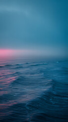 Obraz premium Vast ocean waves, tranquil and deep blue.