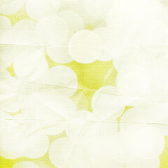 Soft white and yellow bokeh lights on a textured backdrop, creating a bright, dreamy abstract pattern. Perfect for minimal design, presentations, and branding.