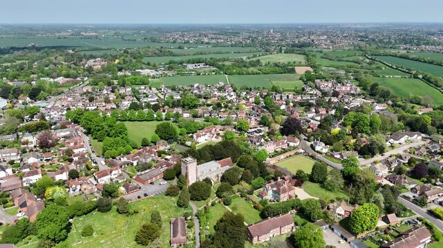 Writtle Village Essex UK pull back drone aerial reverse reveal establishing footage