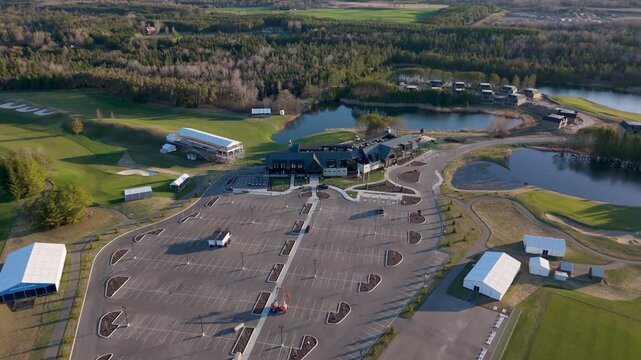 Empty Parking Lot And Clubhouse At TPC Toronto at Osprey Valley In Alton, Caledon, Ontario, Canada. - aerial shot