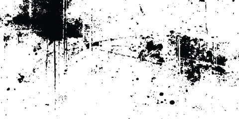 Abstract ink splatter background with black and white textures. Black ink splashes on white background. Abstract grunge texture.