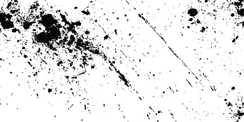 Abstract ink splatter background with black and white textures. Black ink splashes on white background. Abstract grunge texture.