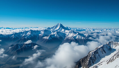Fototapeta premium Snow Mountain Range Above Clouds Under Blue Sky