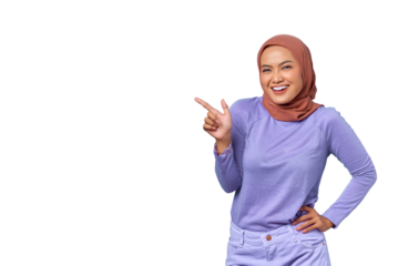 Portrait of smiling young Asian woman pointing finger at copy space isolated on transparent background