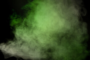 Green and white steam on a black background.