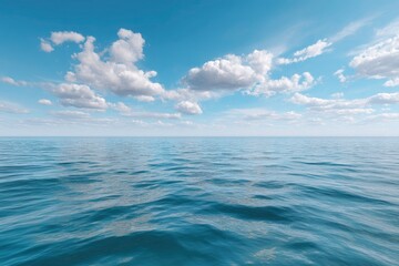 Obraz premium Vast Open Sea with Blue Sky and White Clouds