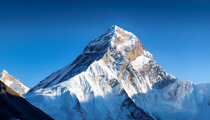 snow capped peak of mount everest against a clear blue sky isolated on a gradient background