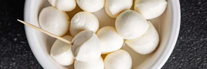 Mozzarella mini cheese balls dish fresh delicious gourmet food background on the table rustic food top view copy space