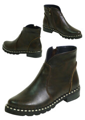 Dark leather ankle boot with studs and zipper transparent background.. Stylish women's footwear product shot. Modern boot with decorative details.
