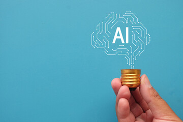 AI concept with a light bulb and circuit design, symbolizing innovation, technology, artificial intelligence, smart ideas, future technology, creativity, and machine learning on a blue background.