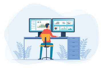 businessman sitting at a desk and analyzing data on two large computer monitors. with colorful charts and graphs. and design concepts for business data analyst and business finance investment.
