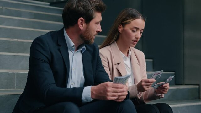 Caucasian colleagues man woman count money salary business financial inequality envy offended female girl worker with laughing happy male manager rivalry jealousy cash bills discrimination in city