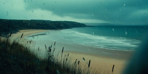 Moody Coastal Scene: Dark Clouds Over a Rain-swept Beach