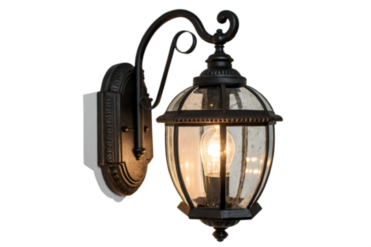 A vintage-style black wall lantern with glass panels and a glowing bulb, featuring an ornate domed top and elegant design for outdoor lighting, isolated on a transparent background