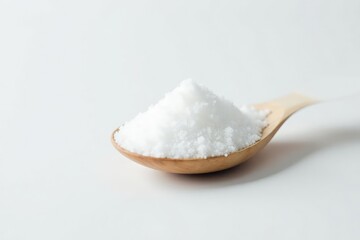 Spoonful of white sugar against white backdrop, crystalline, texture, backdrop