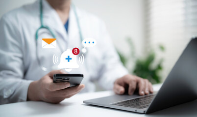 Doctor using phone for health notifications and messages