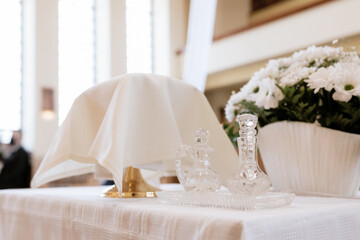 Holy Water in Glass Cruets Used for Catholic Rituals and Blessings