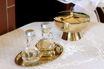 Holy Water in Glass Cruets Used for Catholic Rituals and Blessings