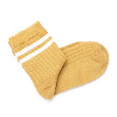 Pair of dark yellow socks isolated on white, top view