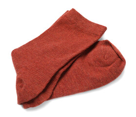 Pair of reddish brown socks isolated on white, top view