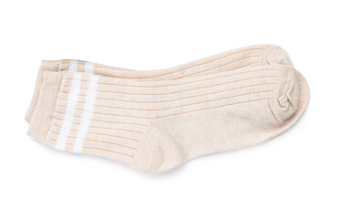 Pair of beige socks isolated on white, top view