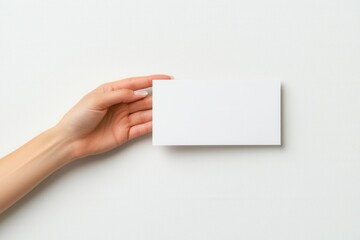 Obraz premium Clean and Minimalist Presentation of Blank Card on White Background