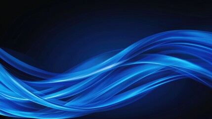 Fototapeta premium Abstract Blue Waves Flowing Smoothly Across Dark Background
