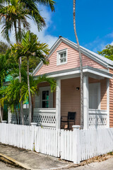 Colorful Conch house with a tropical backyard, pastel colors architecture in Key West, Florida