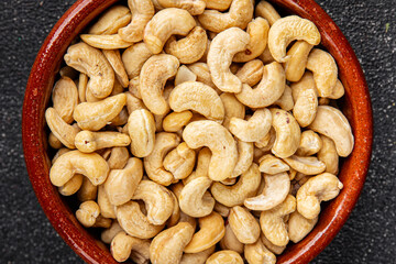 Cashew nuts natural superfood natural food vegetables dish organic product fresh tasty gourmet food background on the table rustic food top view copy space keto and paleo diet vegetarian vegan food