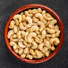 Cashew nuts natural superfood natural food vegetables dish organic product fresh tasty gourmet food background on the table rustic food top view copy space keto and paleo diet vegetarian vegan food