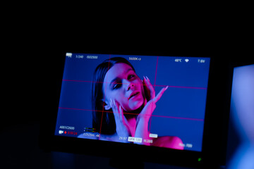 Digital Camera Display Captures Artistic Female Portrait in Studio