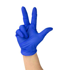 V sign is showed by right man hand in a blue medical glove on a white background. The symbol of Victory. Victory over a virus