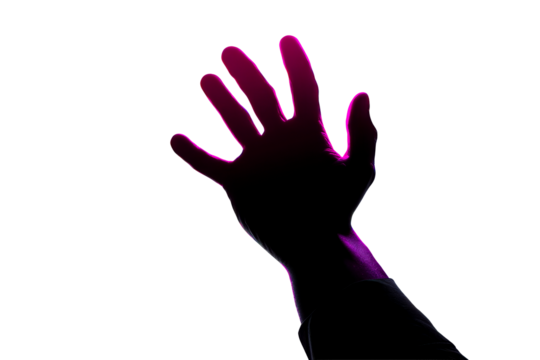 Silhouette of a hand reaching out against a bright background