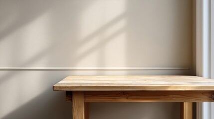 Fototapeta premium empty wooden table near beige wall