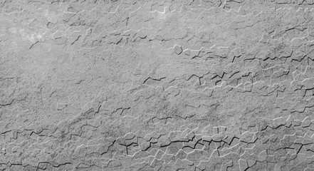 Texture background with cracked soil or randomly cracked rocks, looks intricate and natural pattern for dry, ancient, backdrop, banner, old scene.