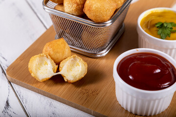 Brazilian snacks, fried balls stuffed with cheese