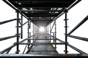 View through scaffolding structure towards bright light ahead