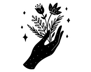 Boho hand holding herbs and flowers