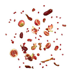 Ripe figs juicy pomegranates and sweet dates falling gracefully isolated on white