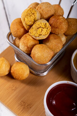 Brazilian snacks, fried balls stuffed with chicken